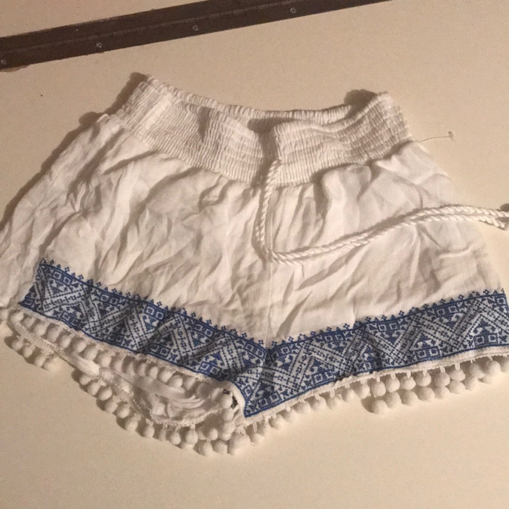 White and blue Aztec patterned shorts